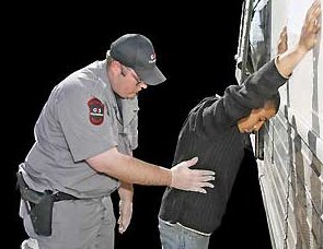 Illegal Immigrant being frisked by ICE