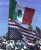 Mexican Flag Above Upside Down American Flag